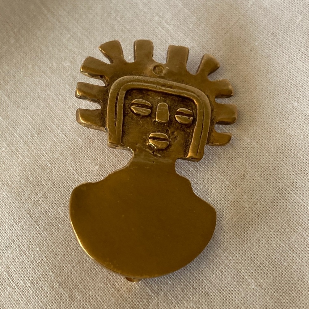 Vintage Alva Museum replica Man of the Sun brooch